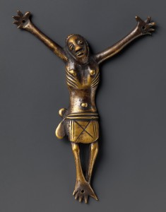 Kongo peoples; Kongo Kingdom, Democratic Republic of the Congo, Republic of the Congo, or Angola, 18th–19th century. Brass (open-back cast). H 43⁄8 in. (11.1 cm), W. 41⁄2 in. (11.4 cm), D. 7⁄8 in. (2.2 cm). The Metropolitan Museum of Art, New York; Gift of Ernst Anspach, 1999. Photo: Courtesy of The Metropolitan Museum of Art.